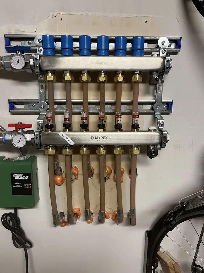 Plumber performing Water Heater Repair at a residential property in North Branch